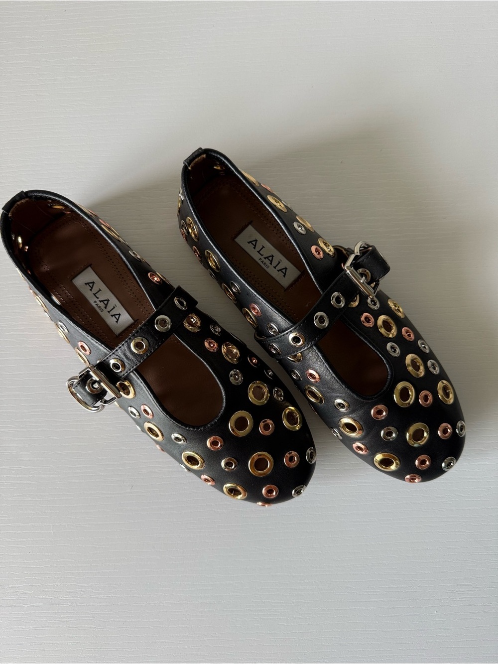 Alaïa Black Grommet-Embellished Leather Mary Jane Flats